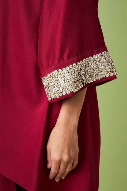 Maroon Cotton Silk Sequin Embellished V-Neck Tunic with Draped Asymmetric Skirt